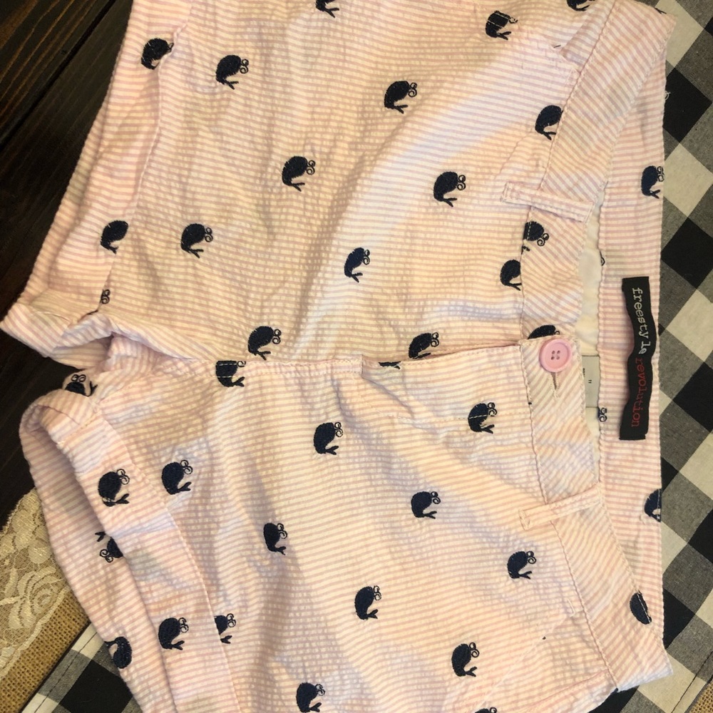 Pink and white seersucker shorts with whales